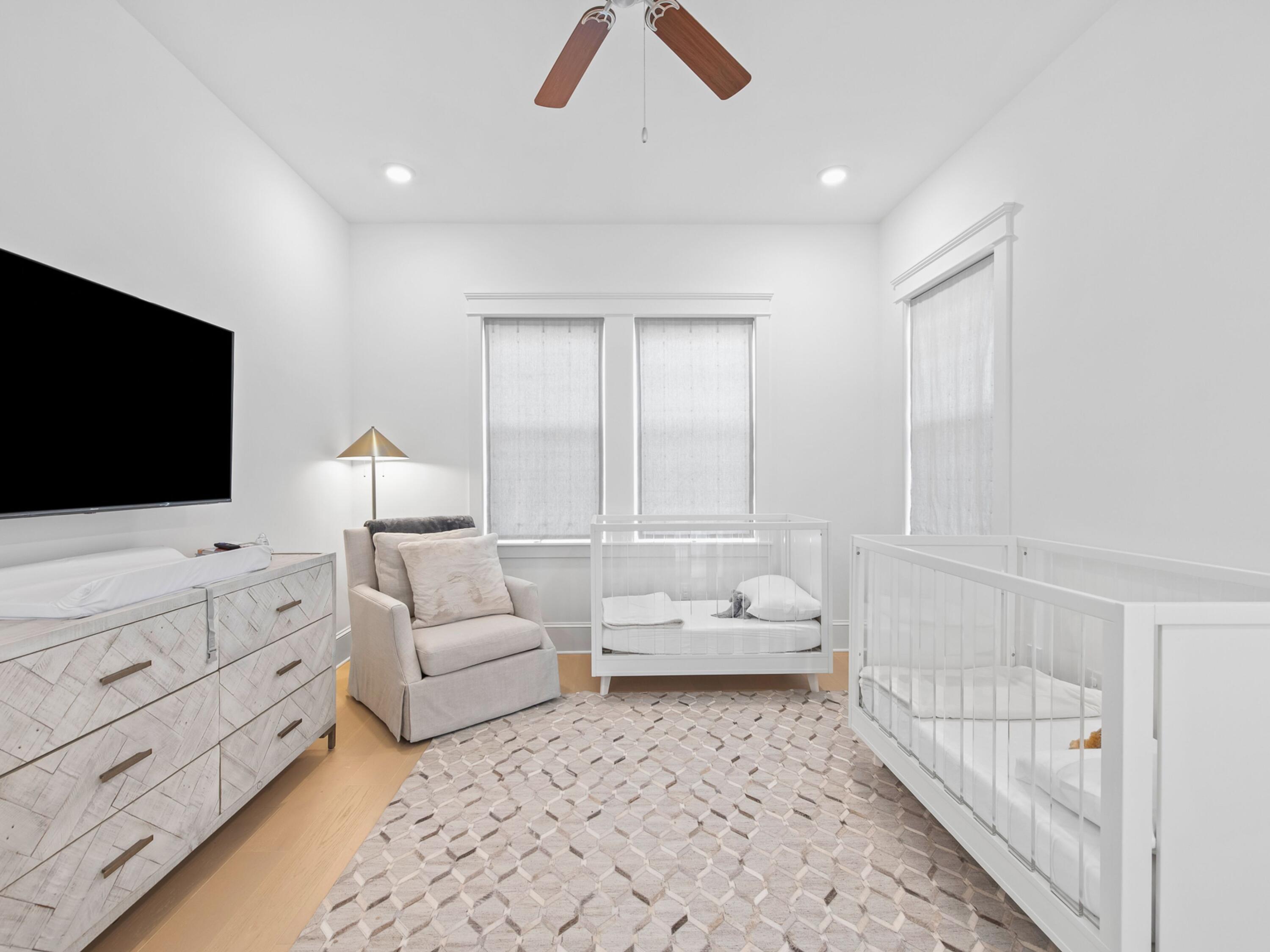 125 Seaboard Lane Santa Rosa Beach, FL 32459 - Photo 34 of 49 a living room with furniture and a flat screen tv