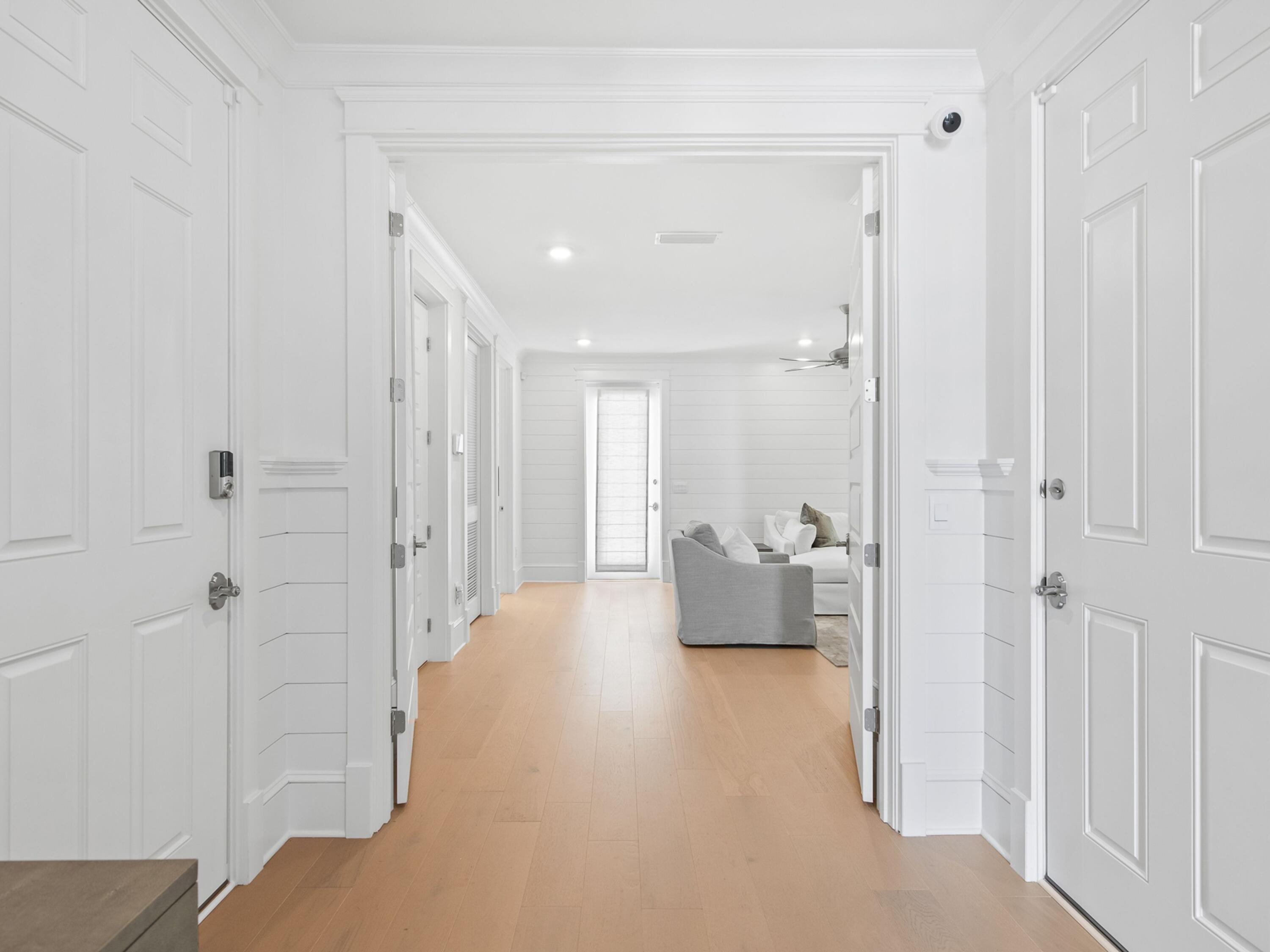 125 Seaboard Lane Santa Rosa Beach, FL 32459 - Photo 38 of 49 a bathroom with a tub shower and bedroom view