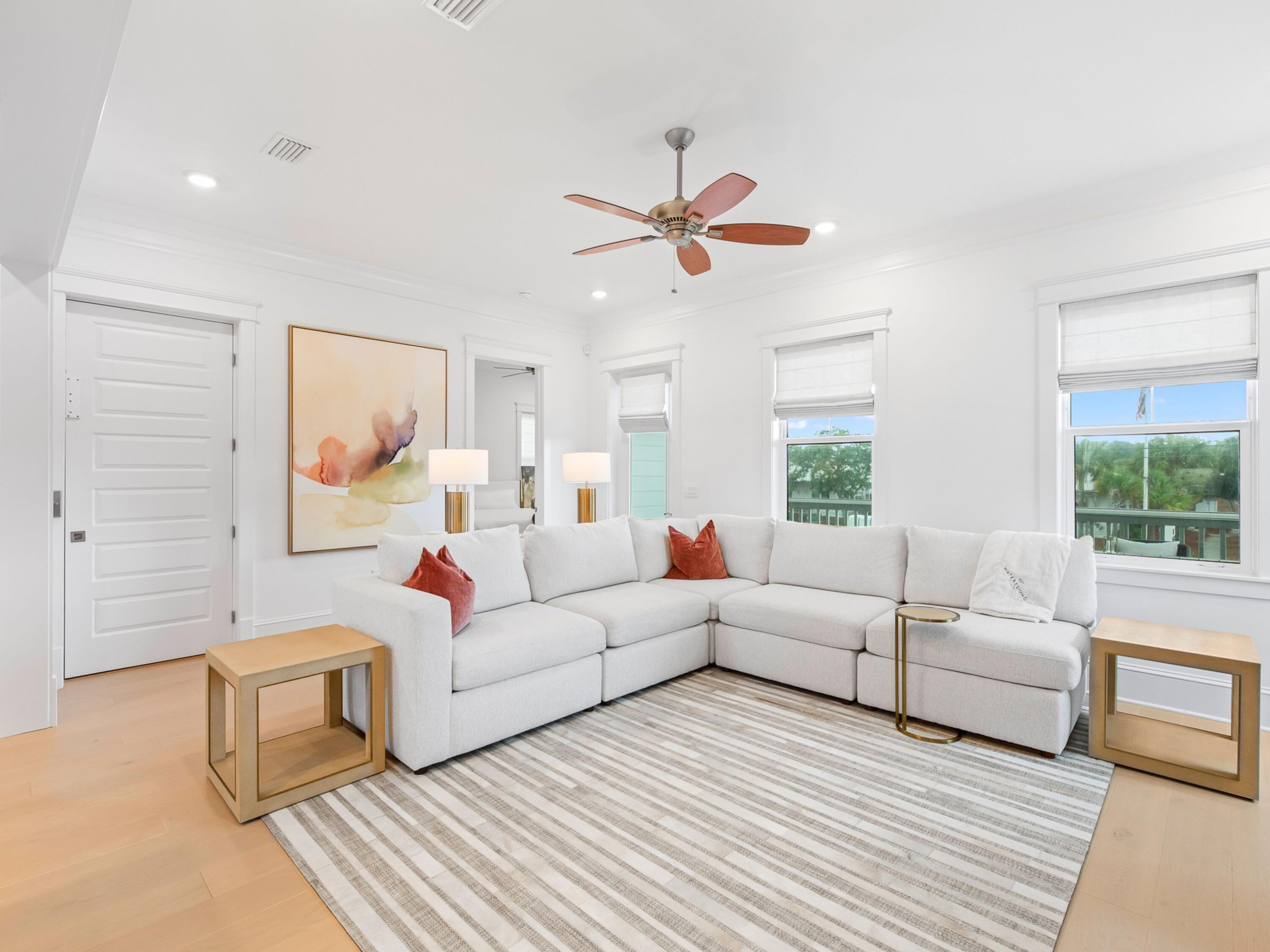 125 Seaboard Lane Santa Rosa Beach, FL 32459 - Photo 4 of 49 a living room with furniture and a large window