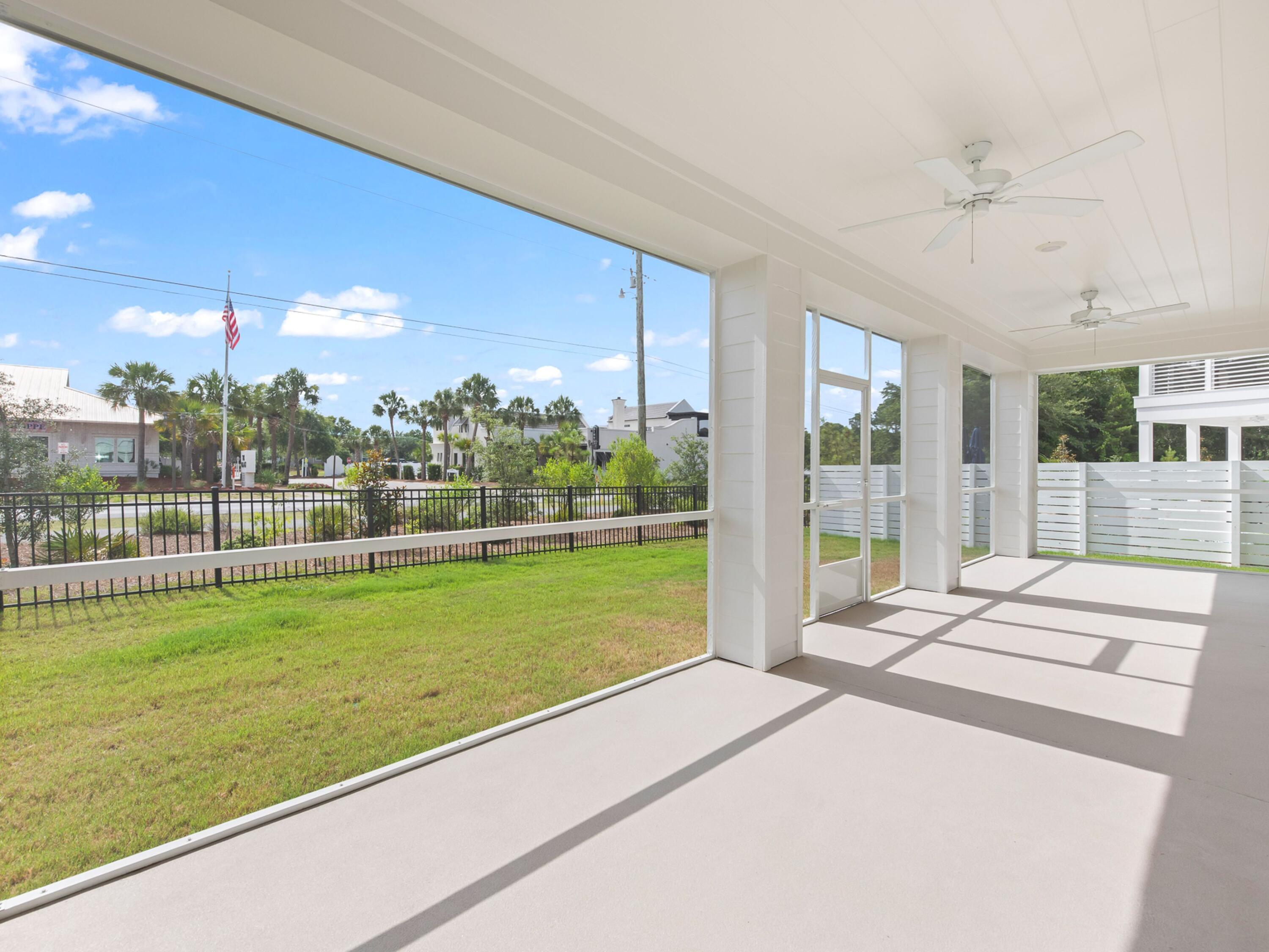 125 Seaboard Lane Santa Rosa Beach, FL 32459 - Photo 45 of 49 a view of a terrace with a big yard