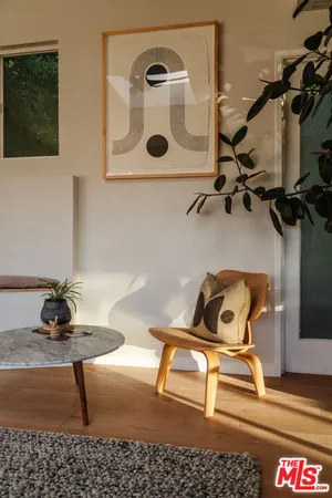 a view of a patio with a table chairs and a table