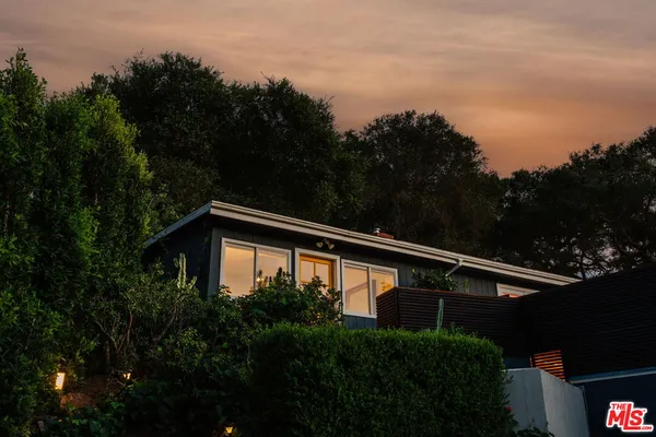 a view of balcony and yard