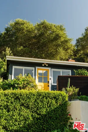a living room with a couch and a table