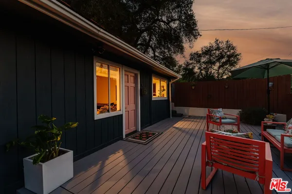 a kitchen with a sink and refrigerator