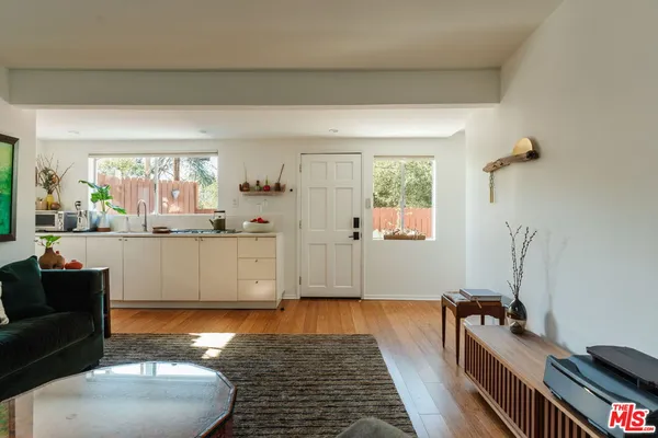 a view of sitting area with furniture in backyard