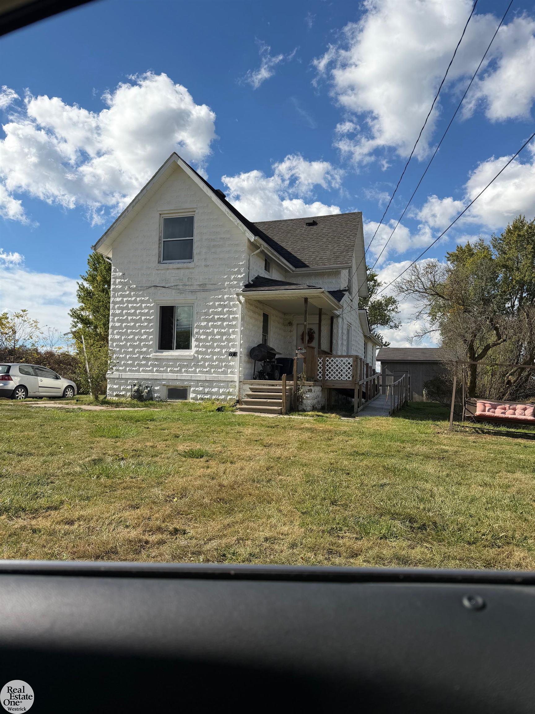 7742 River Road Marine City, MI 48039 - Photo 1 of 25 Front