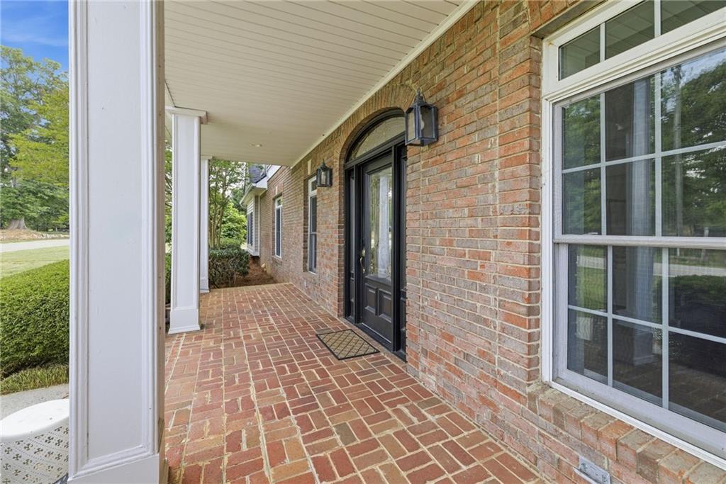 4337 Mountain View Road Oakwood, GA 30566 - Photo 6 of 84 a view of a brick house with a large window