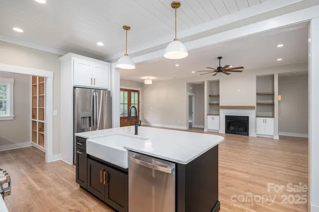 a view of kitchen and sink