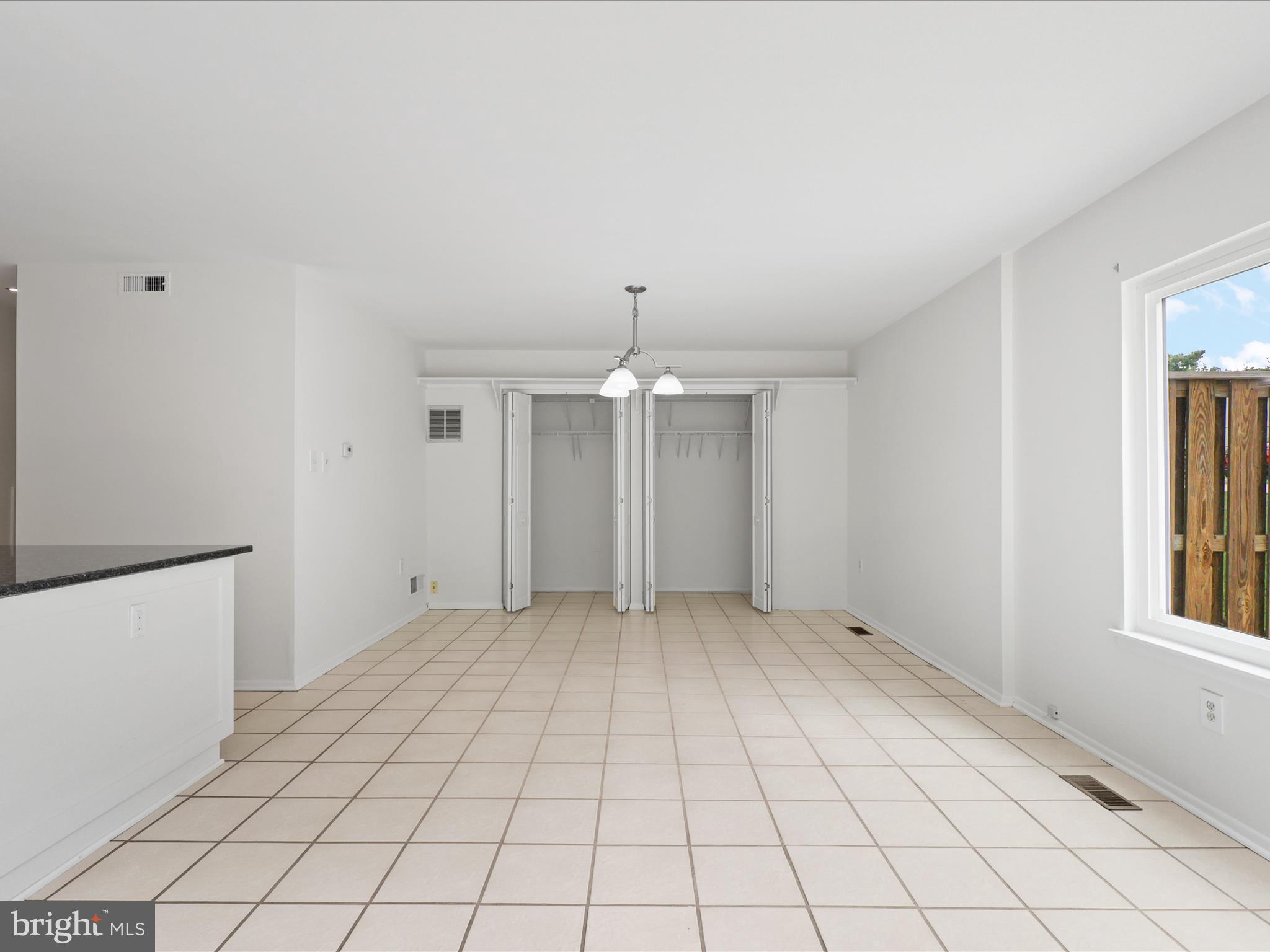 5922 Hall Street Springfield, VA 22152 - Photo 19 of 47 a view of an empty room with window