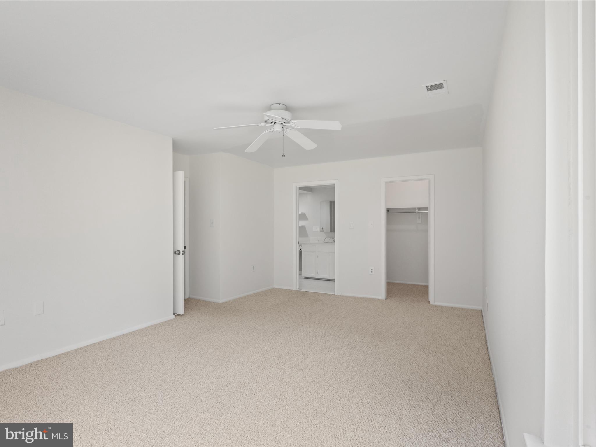 5922 Hall Street Springfield, VA 22152 - Photo 25 of 47 a view of an empty room with a ceiling fan