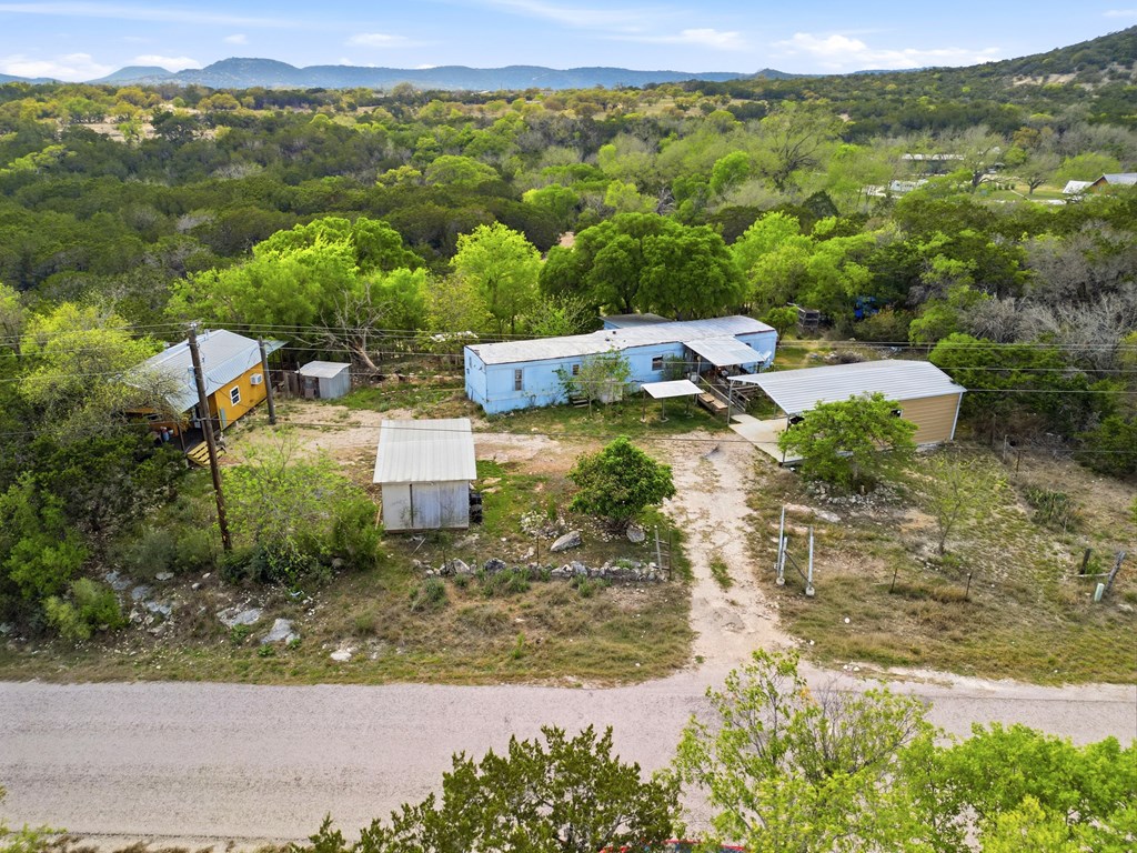 313 Elm Pass II Road East Center Point, TX 78010 - Photo 17 of 37 an aerial view of a house with a yard