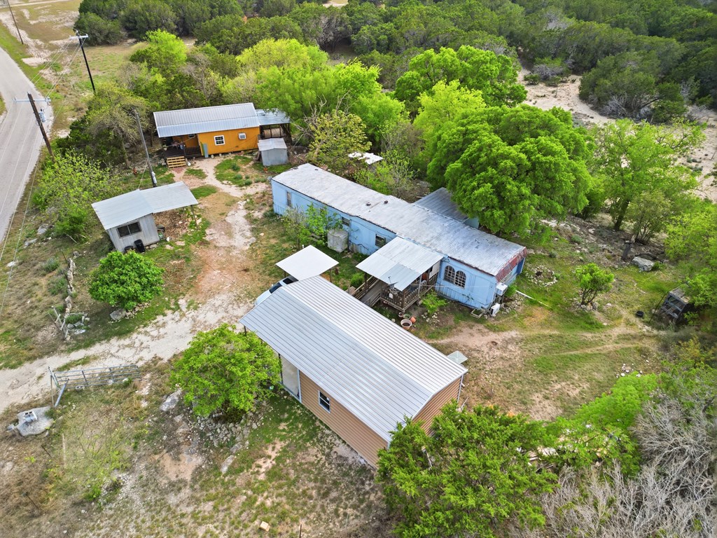 313 Elm Pass II Road East Center Point, TX 78010 - Photo 18 of 37 an aerial view of a house with garden space and street view