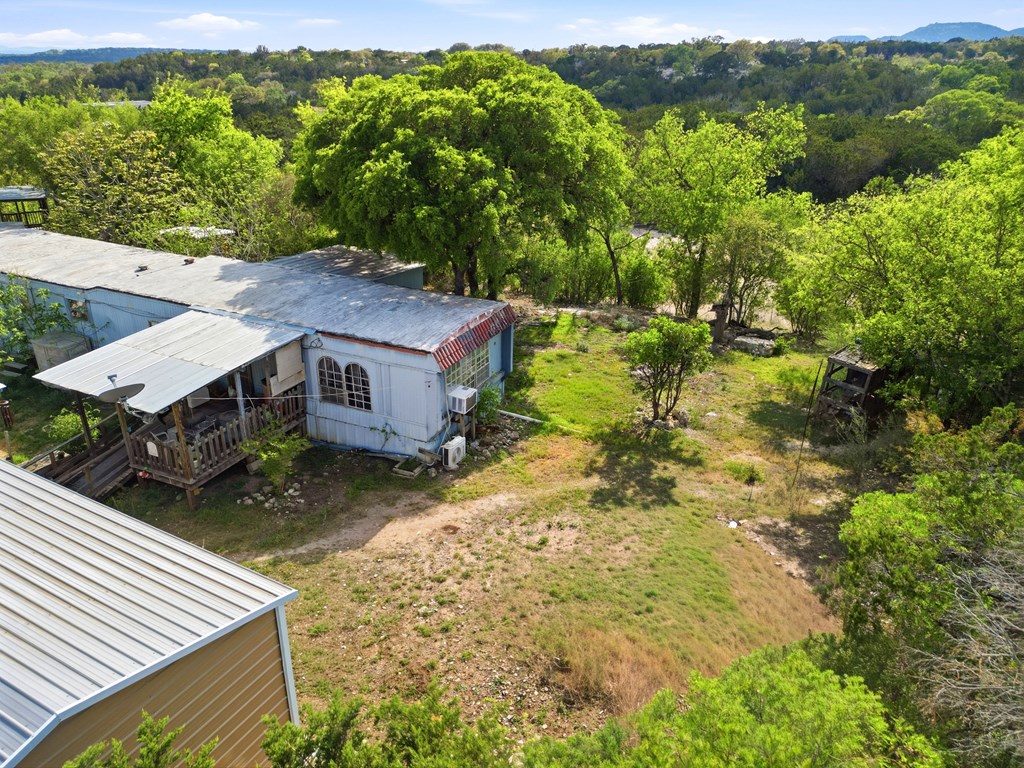 313 Elm Pass II Road East Center Point, TX 78010 - Photo 20 of 37 an aerial view of a house with a yard