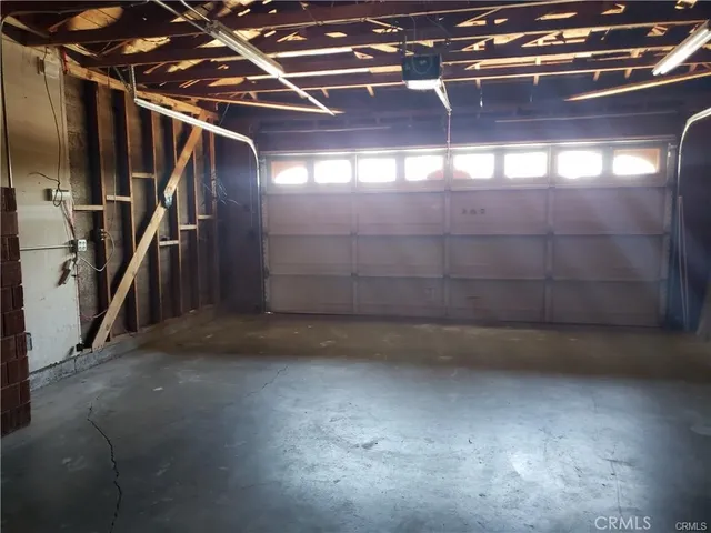 a view of an empty room with stairs