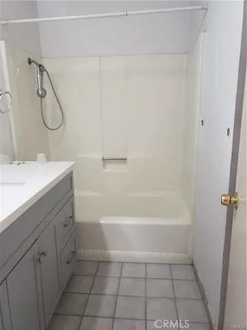 a bathroom with a sink a toilet and a bathtub