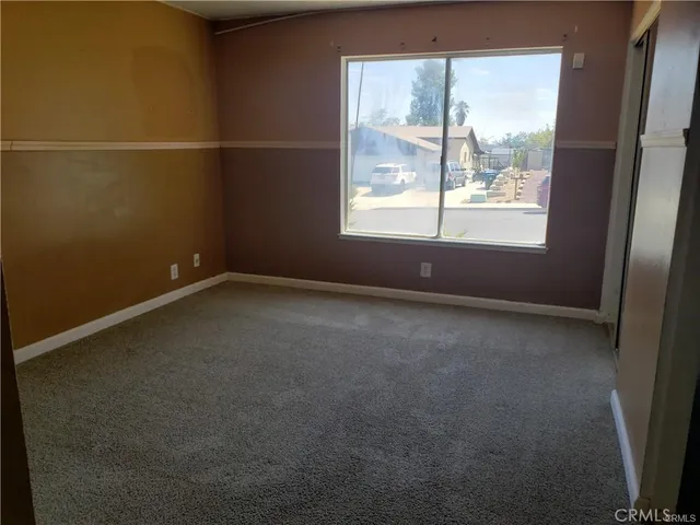 an empty room with a window