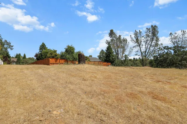 a view of a large body of water with a building in the background