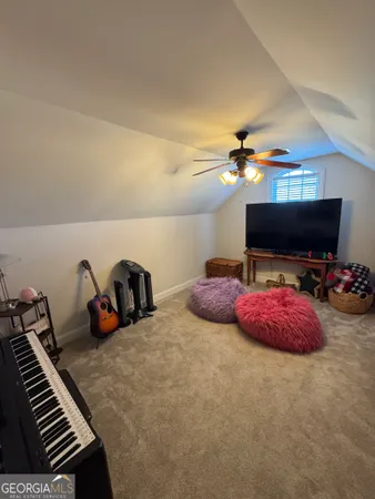 a bedroom with furniture and a chandelier