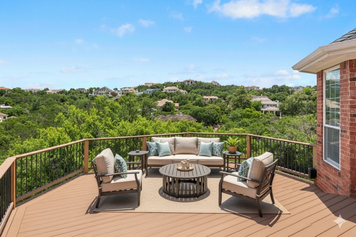 2807 Round Table Road Austin, TX 78746 - Photo 2 of 38 Deck featuring view of scattered trees