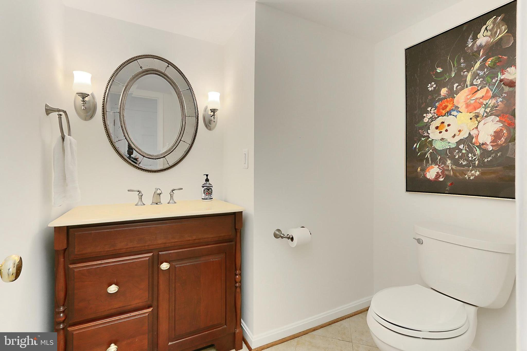 2011 Soapstone Drive Reston, VA 20191 - Photo 23 of 54 Elegant Main Level Half Bath w/ Custom Mirror