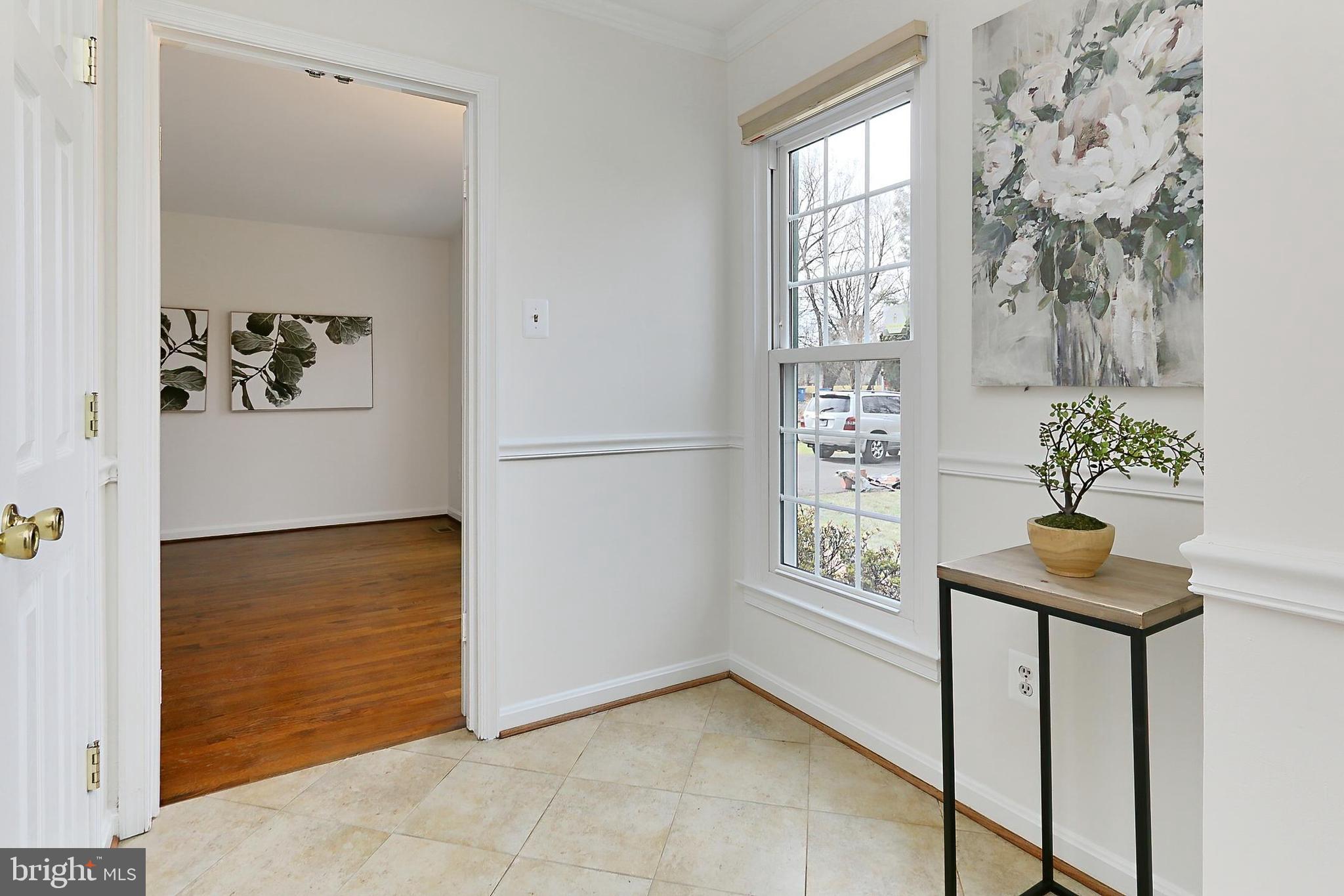 2011 Soapstone Drive Reston, VA 20191 - Photo 5 of 54 Foyer extension includes room for Seating/Bench