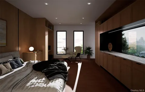 a large bedroom with a large bed and a large window