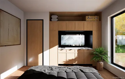 a room with furniture and flat screen tv