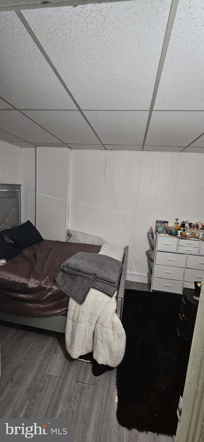 439 Buttonwood Street Reading, PA 19601 - Photo 17 of 33 a bedroom with a bed and a night stand
