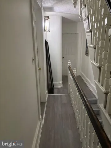 a view of a hallway with front door