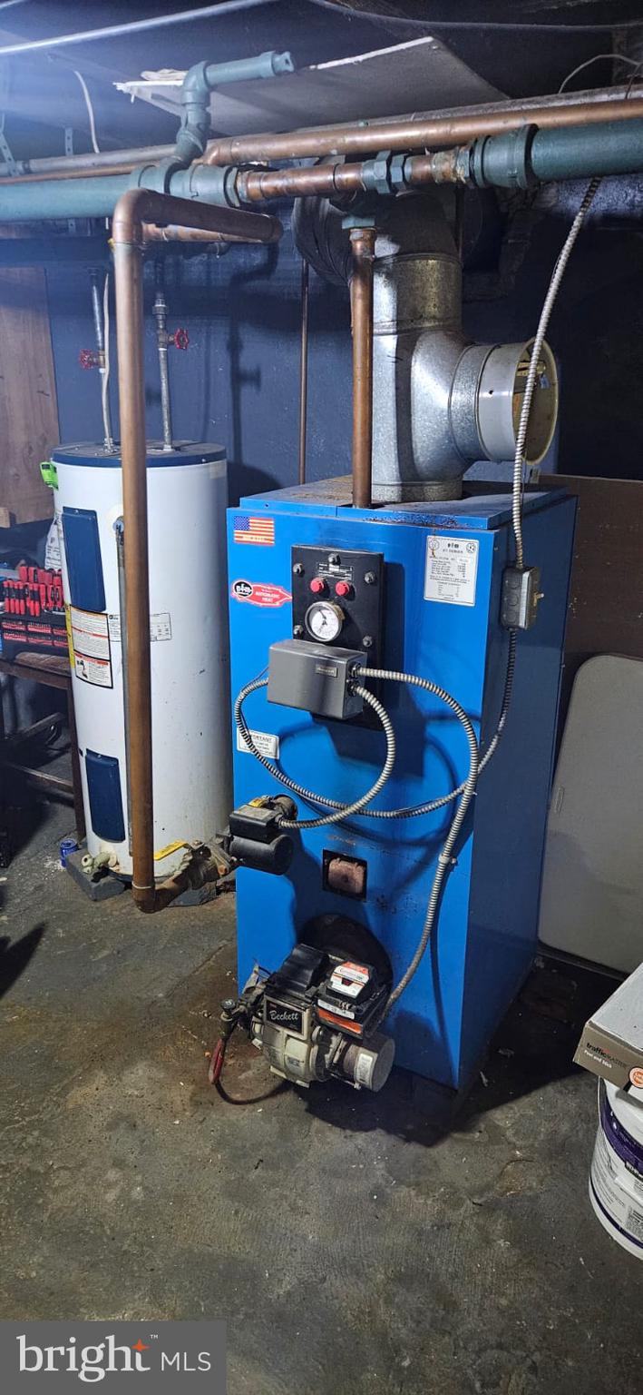 439 Buttonwood Street Reading, PA 19601 - Photo 30 of 33 a room with storage and utility