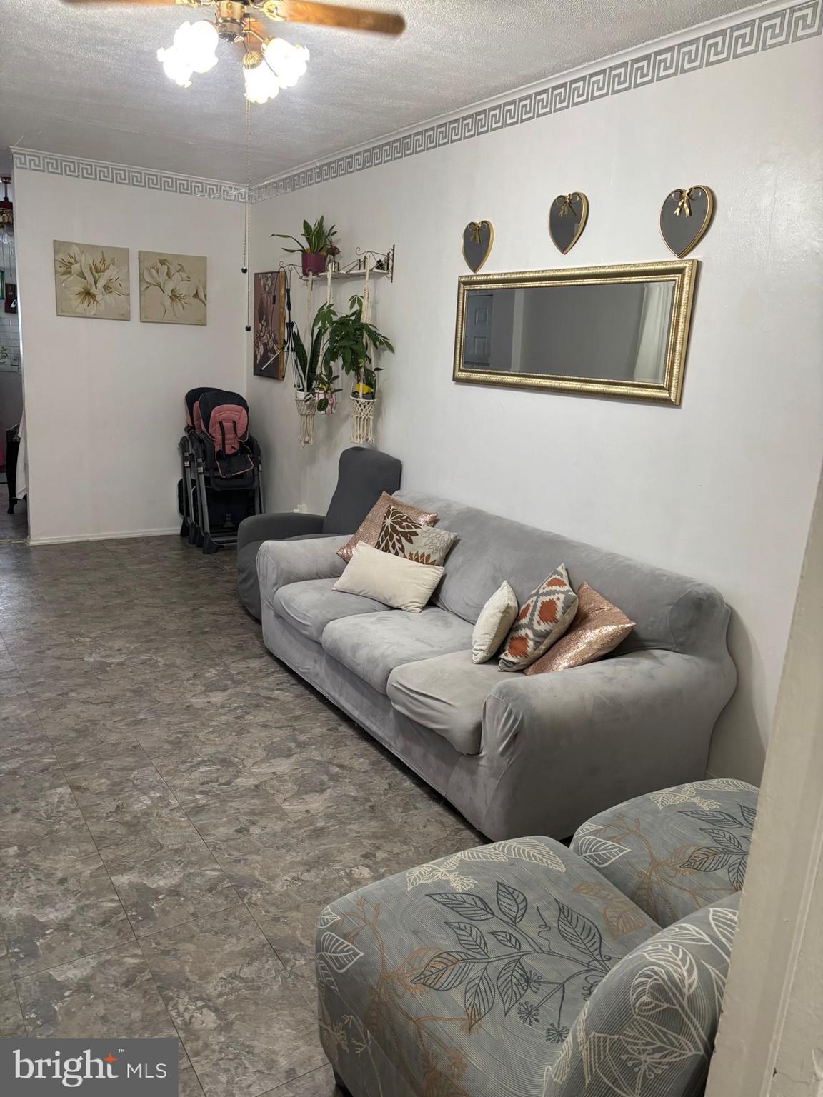 439 Buttonwood Street Reading, PA 19601 - Photo 8 of 33 a living room with furniture and a couch