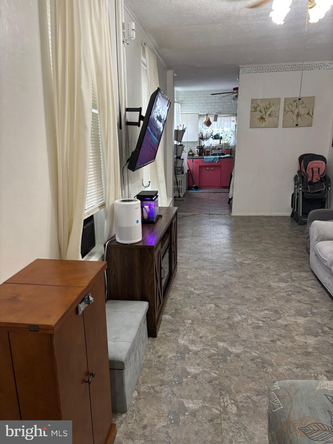 439 Buttonwood Street Reading, PA 19601 - Photo 9 of 33 a living room with furniture and a gate