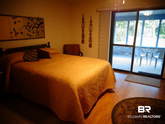 2804 Pine Ridge Drive Lillian, AL 36549 - Photo 26 of 39 17 x 14. Laminate wood look floor. Sliding door to screened porch. Accordion door.
