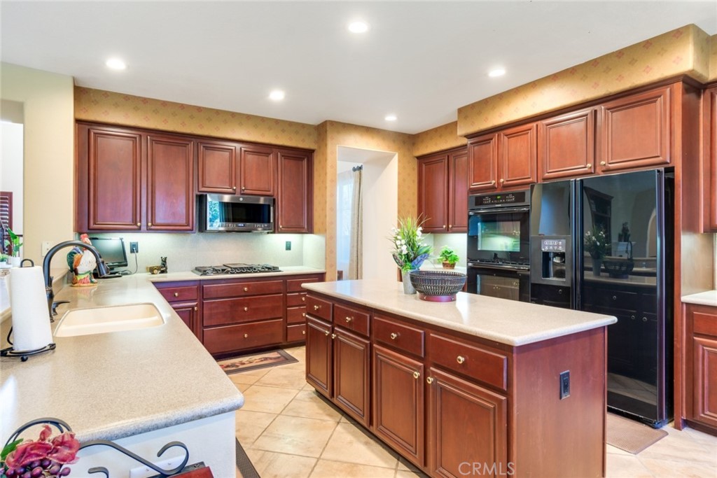SPACIOUS KITCHEN OPEN TO FAMILY ROOM