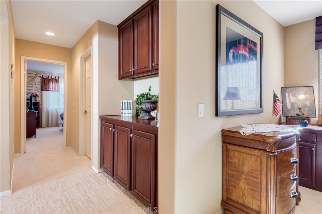 2967 Mangular Avenue Corona, CA 92882 - Photo 23 of 37 a view of a kitchen cabinets and furniture