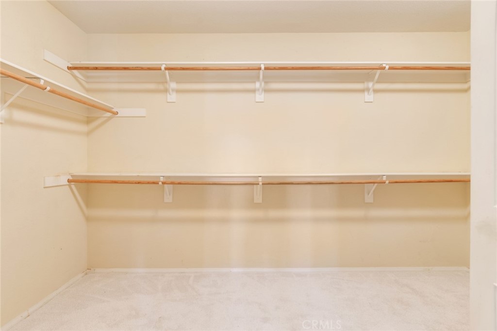 2967 Mangular Avenue Corona, CA 92882 - Photo 32 of 37 a bathroom with a shower