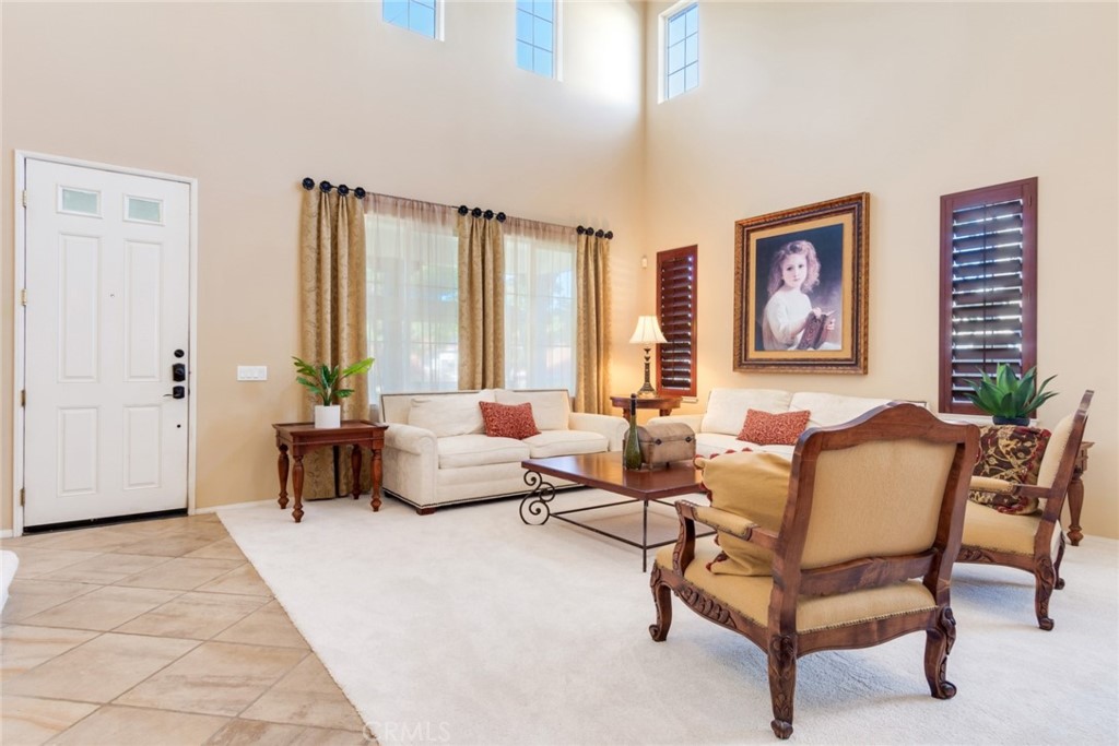 2967 Mangular Avenue Corona, CA 92882 - Photo 6 of 37 a living room with furniture and a window
