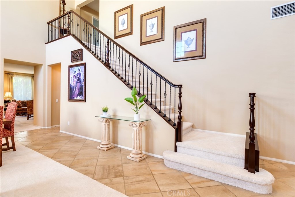 2967 Mangular Avenue Corona, CA 92882 - Photo 7 of 37 a view of entryway and hall with wooden floor