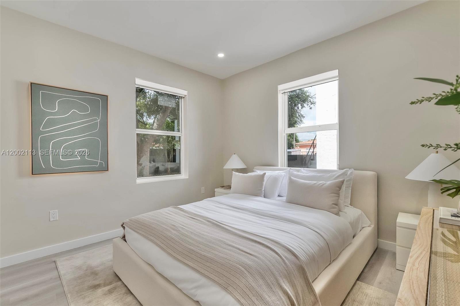 1852 Southwest 22nd Terrace, Unit 2 Miami, FL 33145 - Photo 12 of 20 a bedroom with a bed and a window