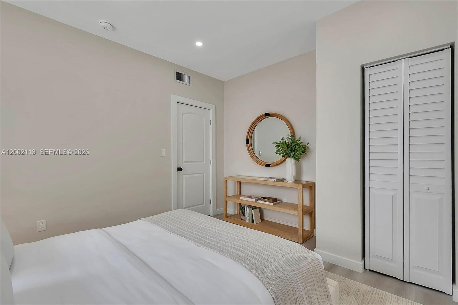 1852 Southwest 22nd Terrace, Unit 2 Miami, FL 33145 - Photo 13 of 20 a bedroom with a bed and a window