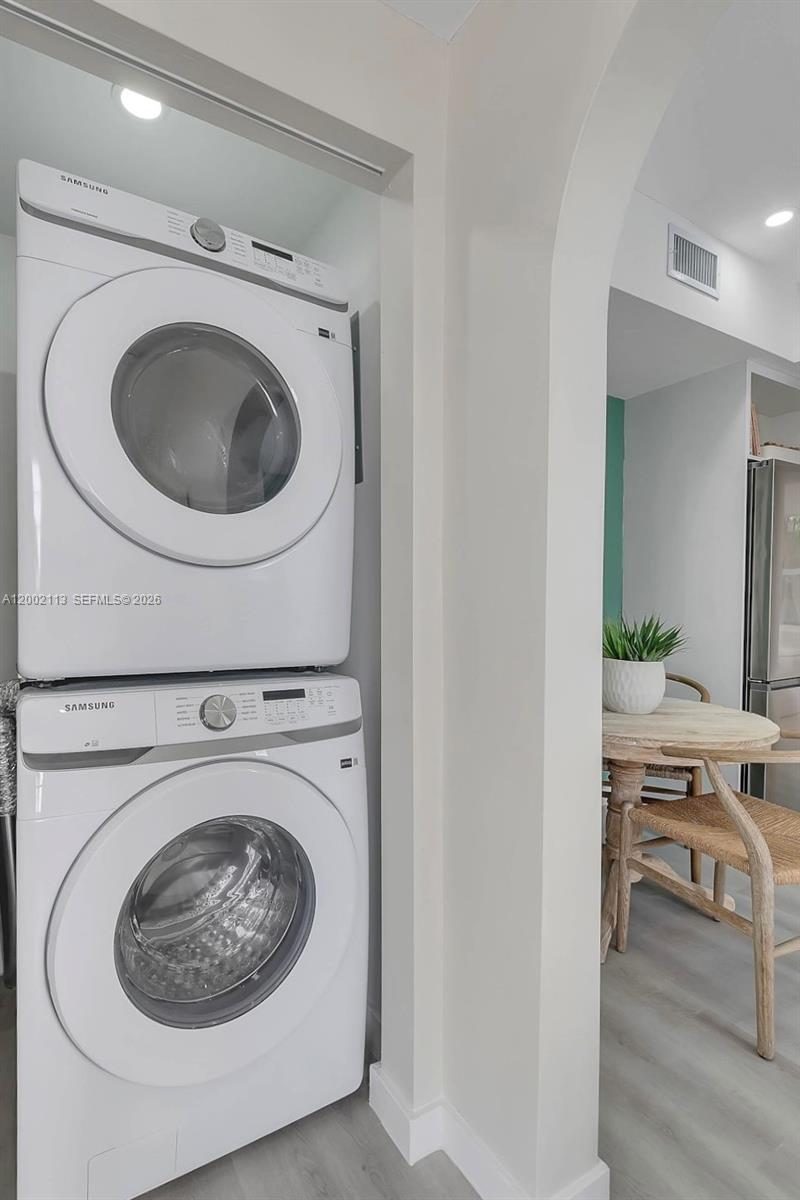 1852 Southwest 22nd Terrace, Unit 2 Miami, FL 33145 - Photo 14 of 20 a utility room with sink dryer and washer