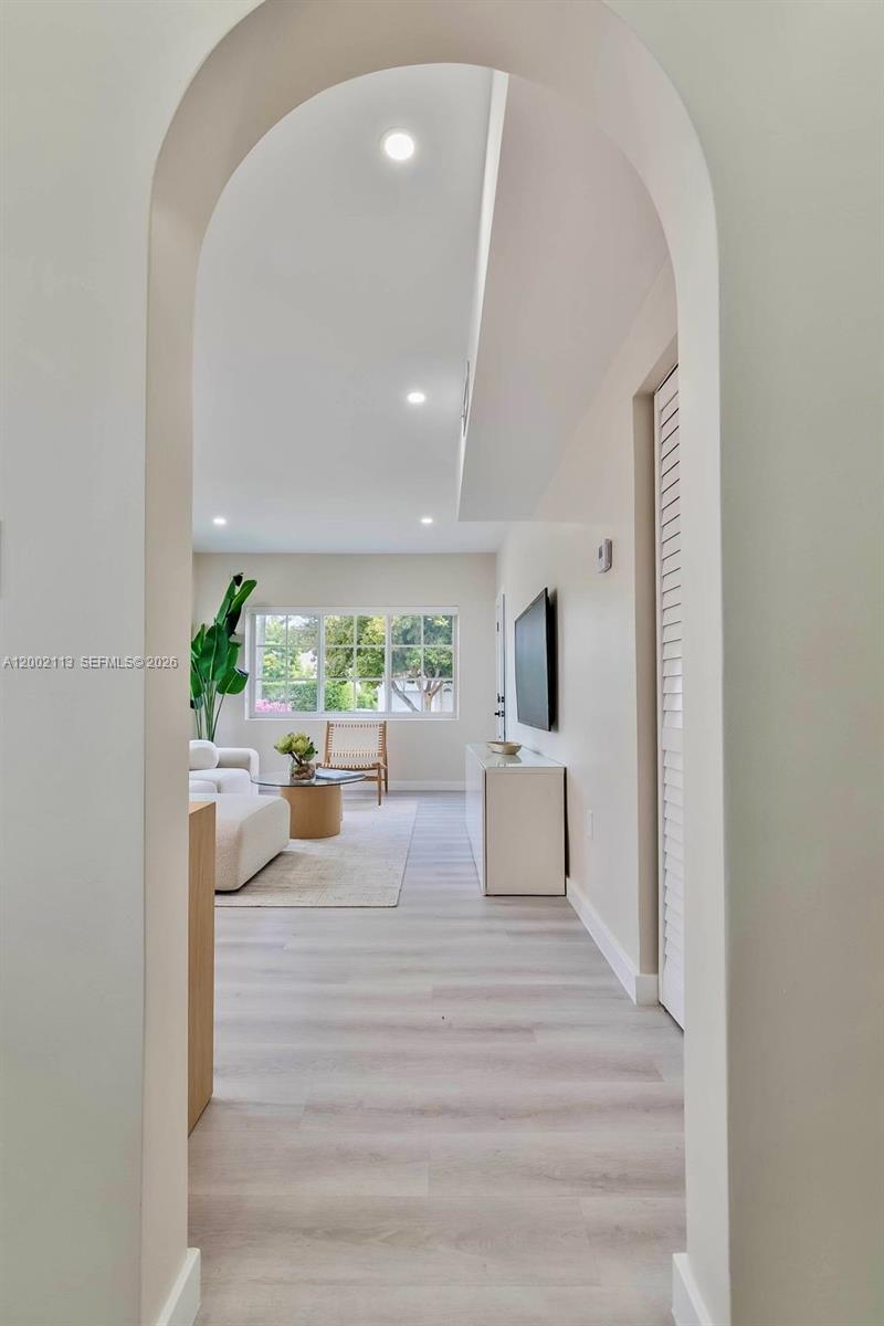 1852 Southwest 22nd Terrace, Unit 2 Miami, FL 33145 - Photo 6 of 20 a view of a living room and kitchen
