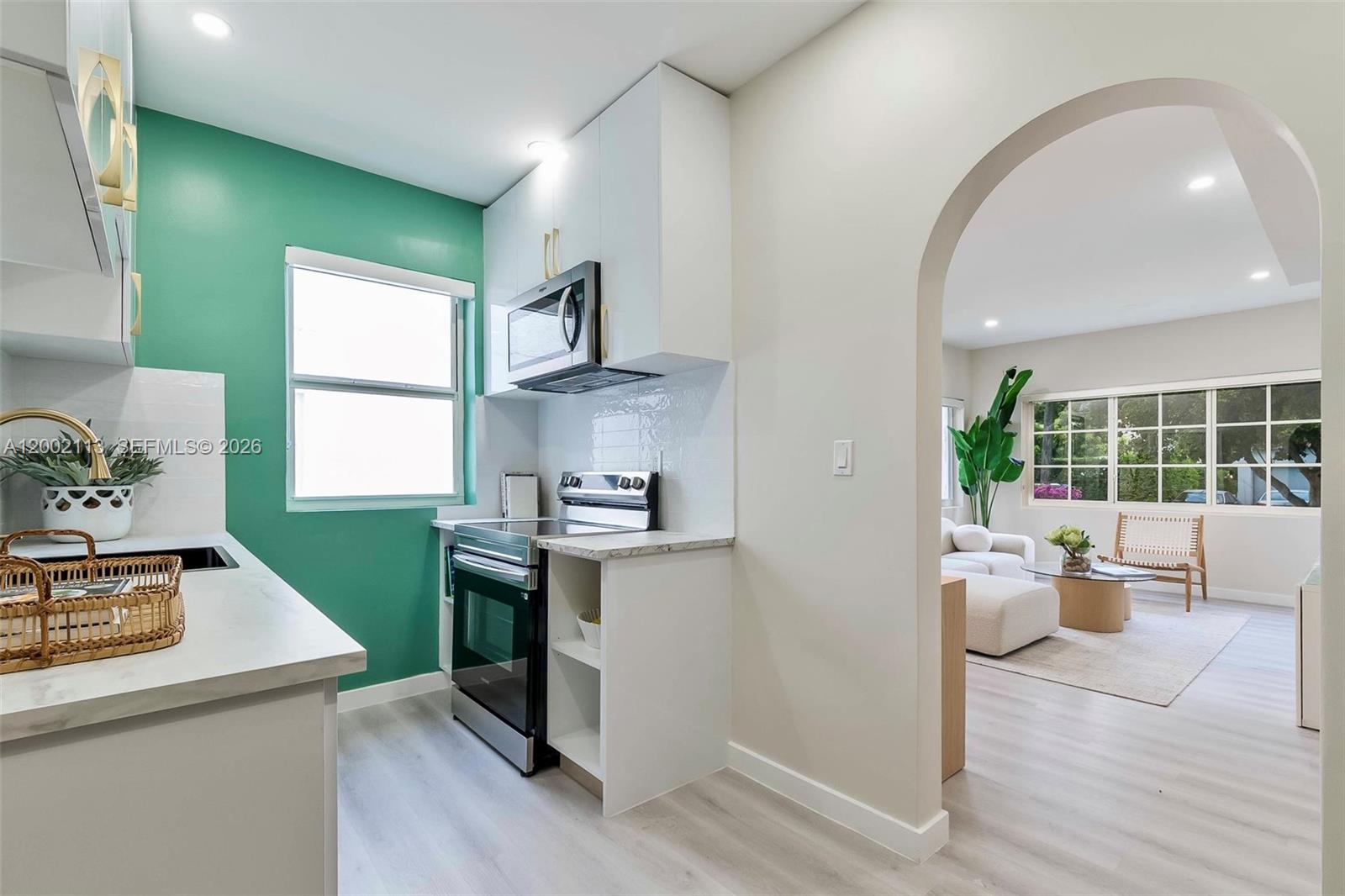 1852 Southwest 22nd Terrace, Unit 2 Miami, FL 33145 - Photo 9 of 20 a view of a kitchen with a sink and a window