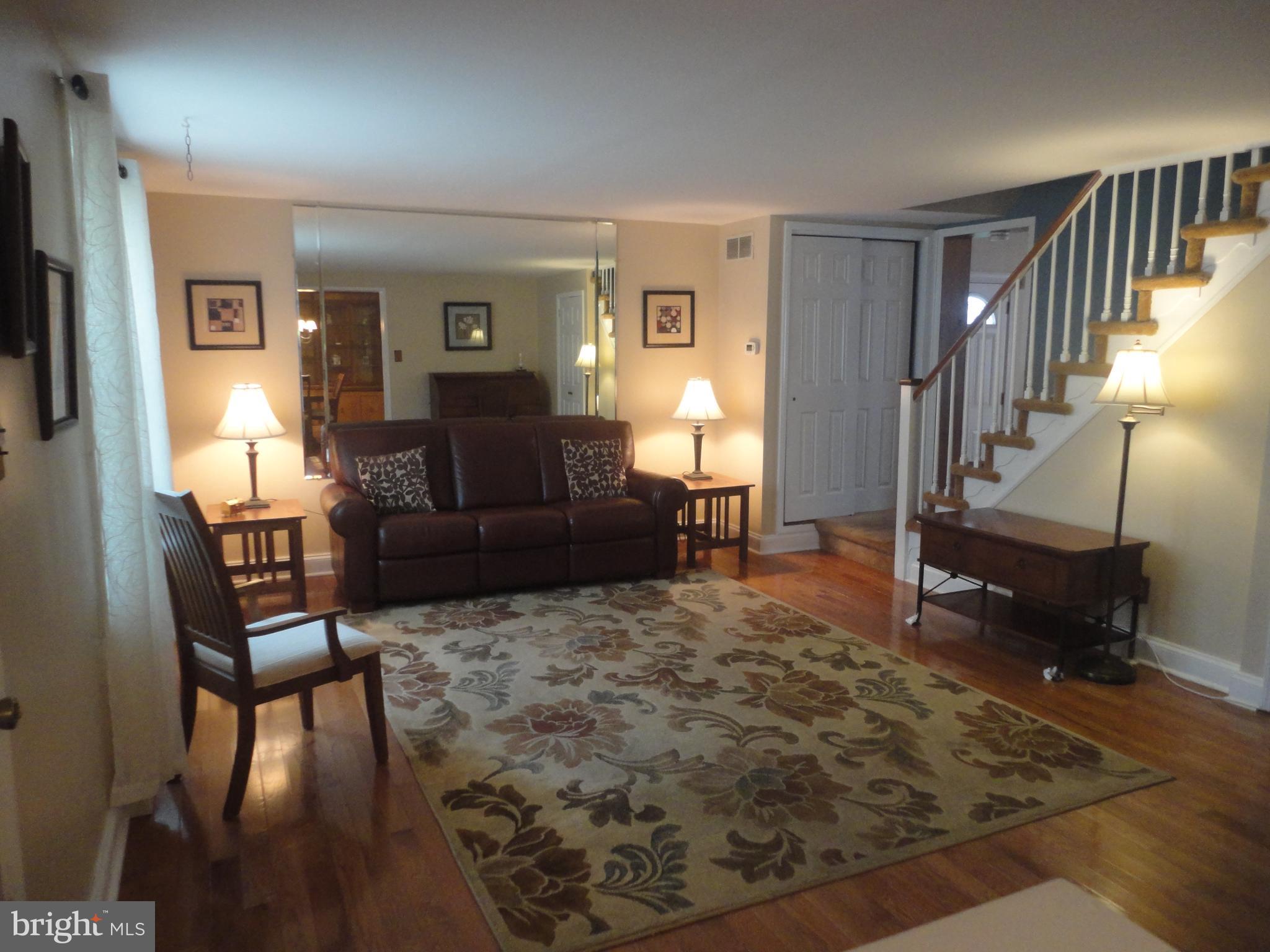 610 Hawarden Road Springfield, PA 19064 - Photo 4 of 38 spacious Living Room & gleaming hardwoods