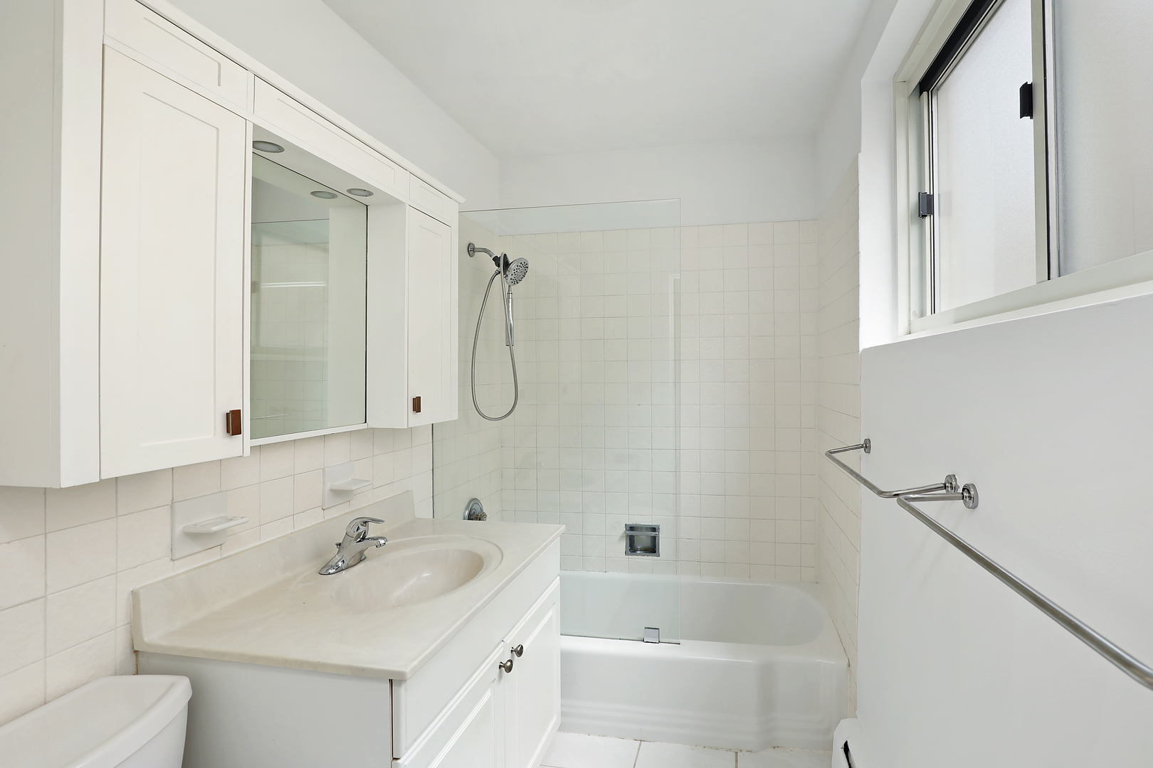 2730 Central Street, Unit 3A Evanston, IL 60201 - Photo 13 of 18 a bathroom with a sink toilet tub and shower