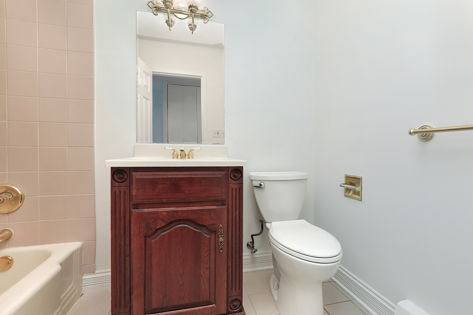2730 Central Street, Unit 3A Evanston, IL 60201 - Photo 14 of 18 a bathroom with a sink a toilet and shower