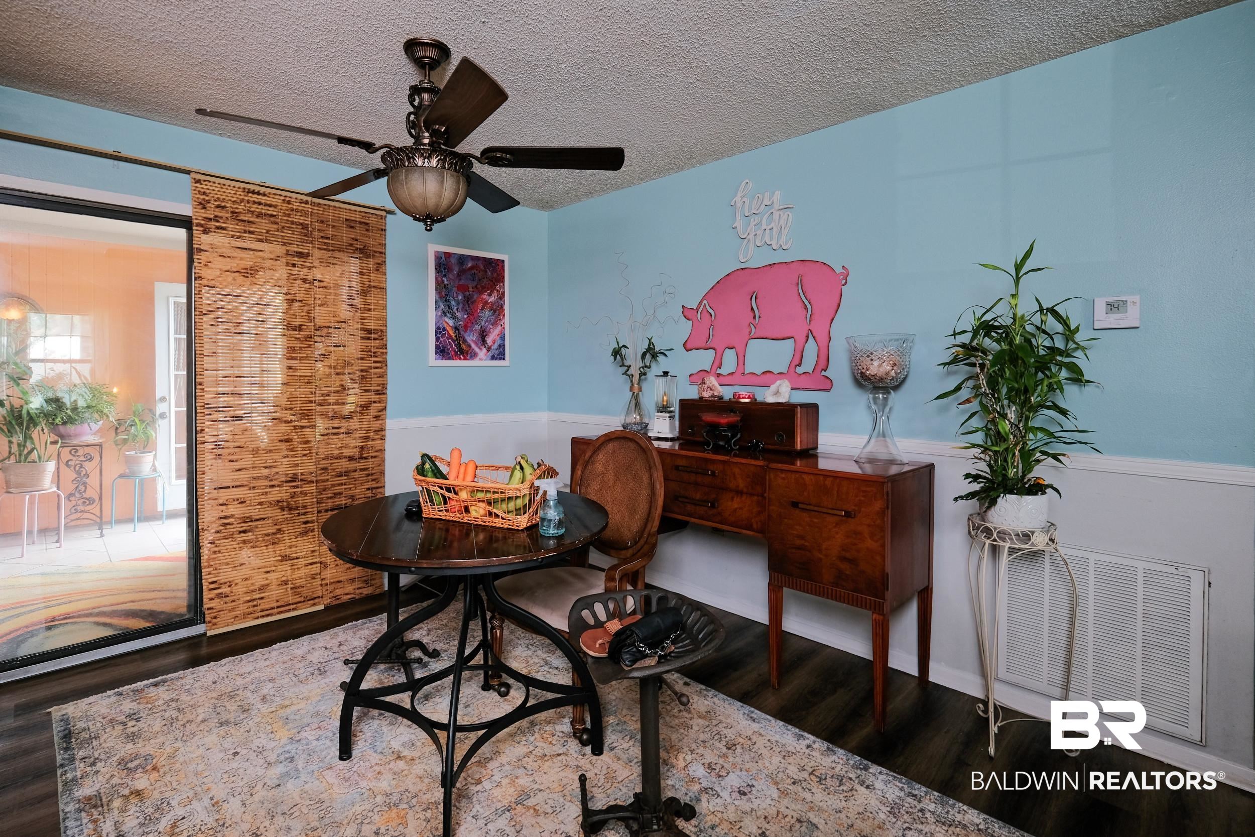 504 Ariel Avenue Foley, AL 36535 - Photo 15 of 33 Office area with a textured ceiling, ceiling fan, and dark wood-type flooring