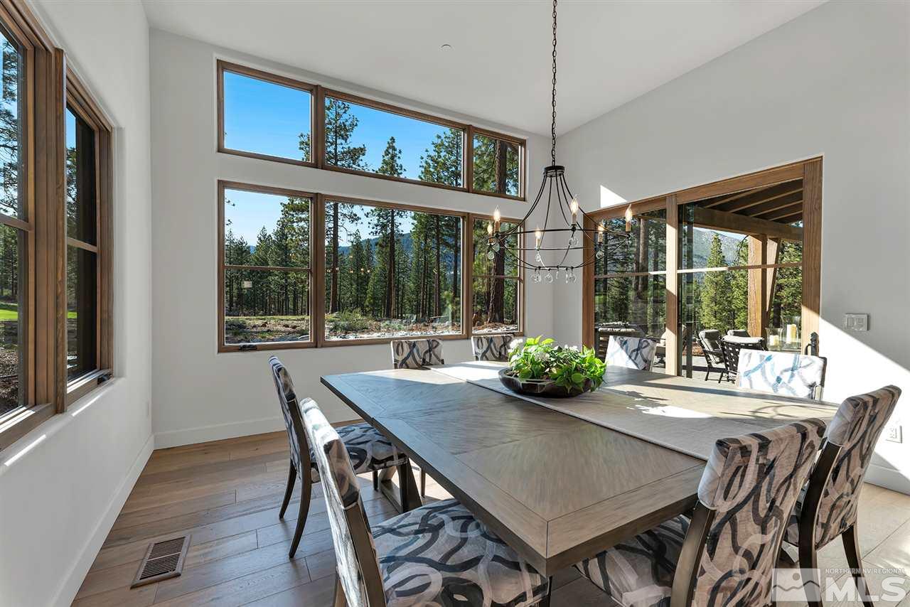 249 Mill Race Loop Carson City, NV 89705 - Photo 14 of 40 a view of a dining room with furniture window and wooden floor
