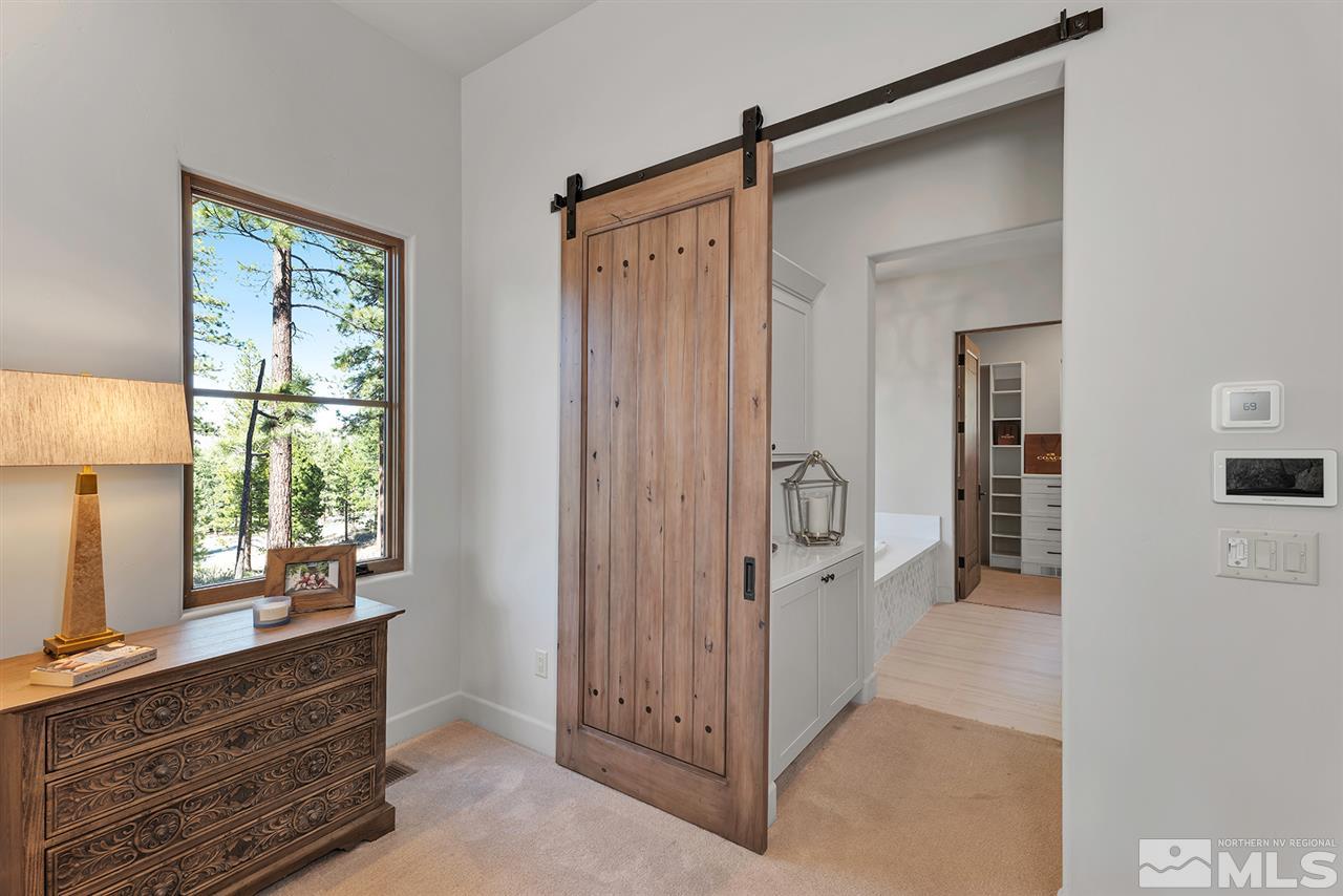 249 Mill Race Loop Carson City, NV 89705 - Photo 18 of 40 a view of closet with two mirror and a window