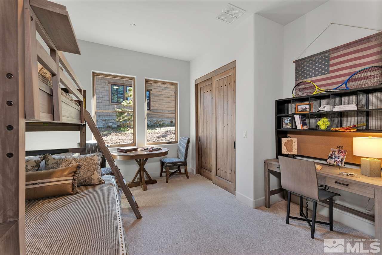 249 Mill Race Loop Carson City, NV 89705 - Photo 24 of 40 a view of a workspace with furniture and a window